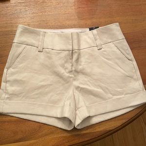 Khaki colored dressy express shorts, never worn